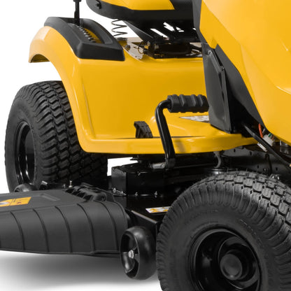 Close-up of a yellow Cub Cadet XT2 LX 46 ride on lawn mower with black tires on a white background