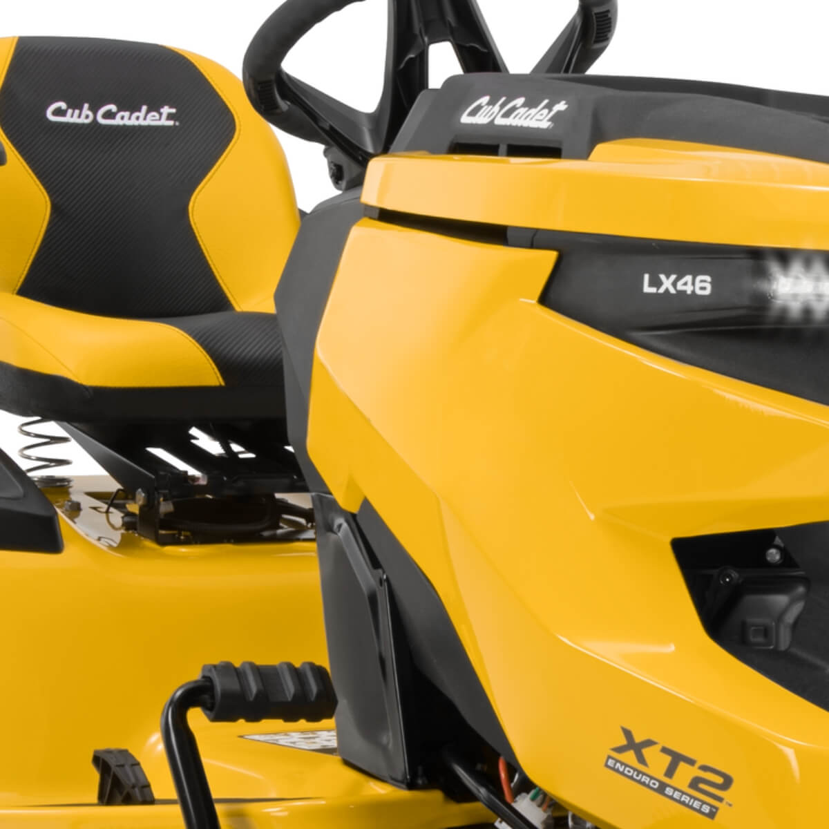 Yellow Cub Cadet lawn mower with black seat on a white background featuring the LX 46 XT2 Enduro