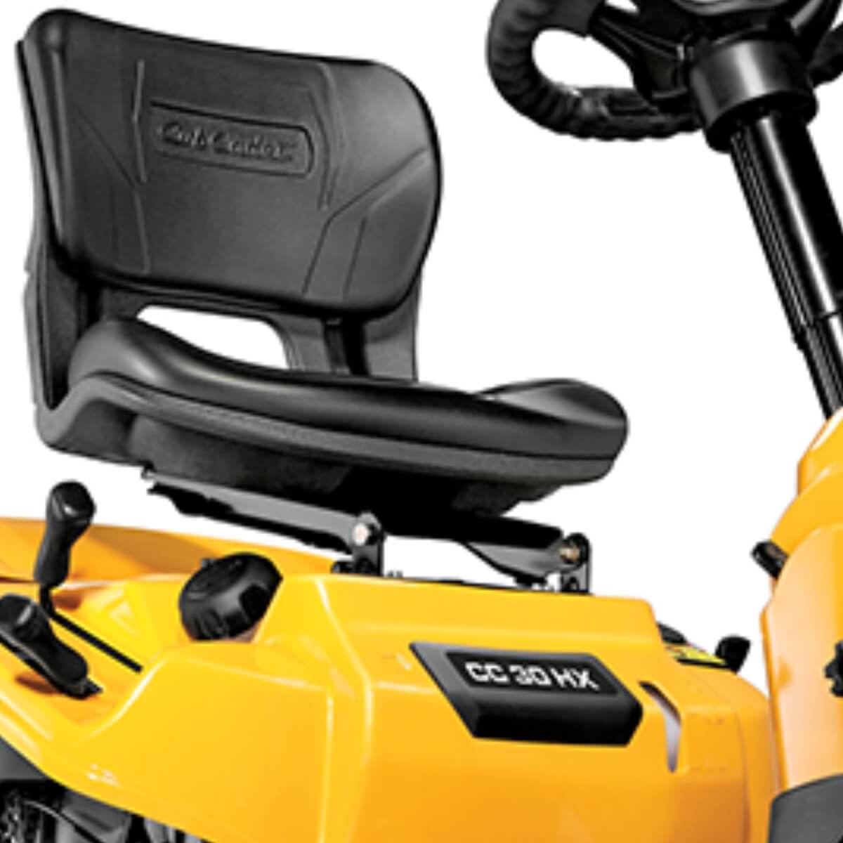 Close-up of a yellow Cub Cadet CC30 HX with a black seat and control handles.