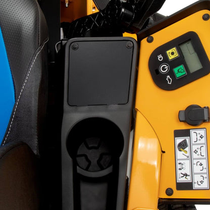 Close-up of a yellow ride on mower with control panel and cup holder.