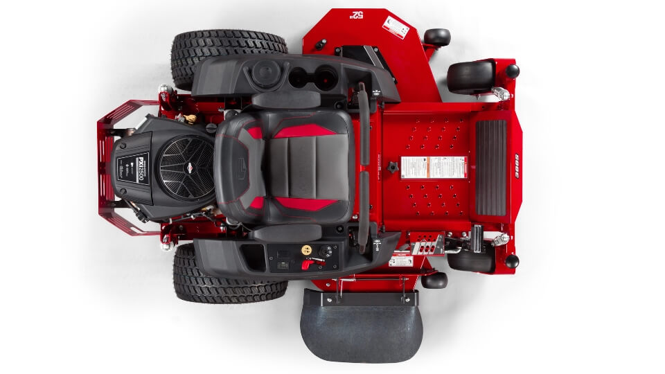 Top view looking down on a red Ferris 300S ride on mower showing the four wheels, seat and engine.