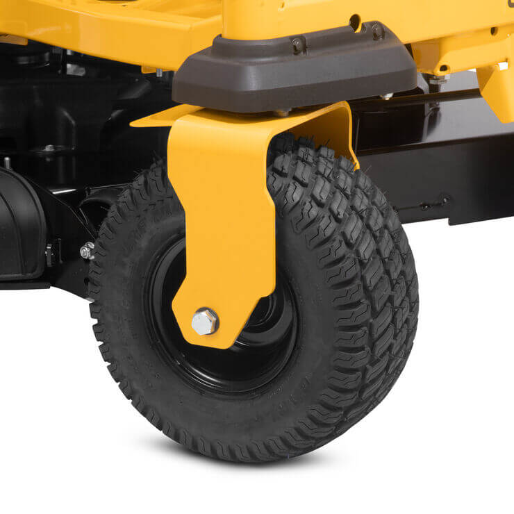 Close-up of a yellow lawn mower wheel and turf tread on a white background