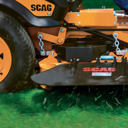 Close-up of a SCAG lawn mower on grass